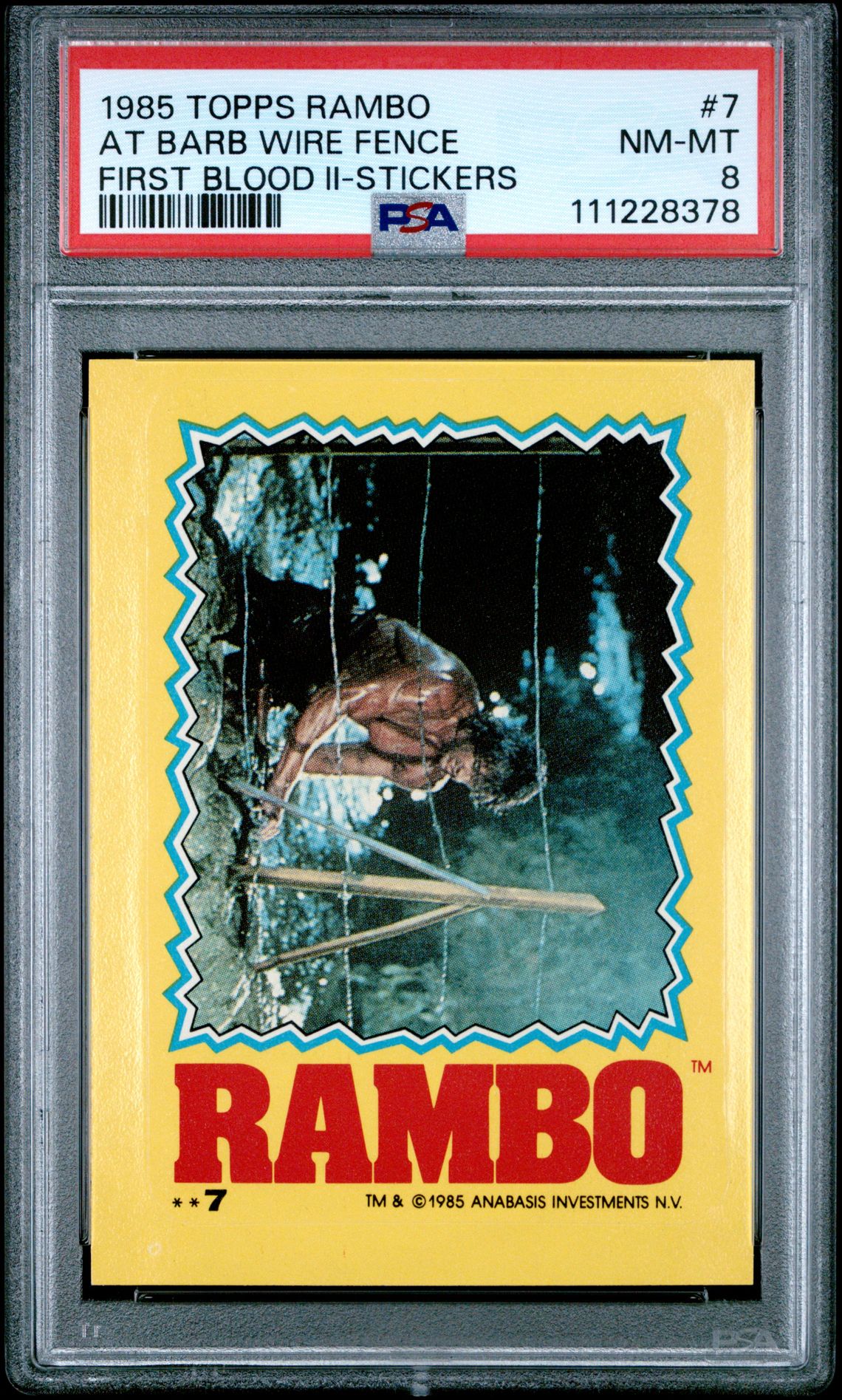 1985 Topps TOPPS RAMBO FIRST BLOOD II-STICKERS #7 At Barb Wire Fence front