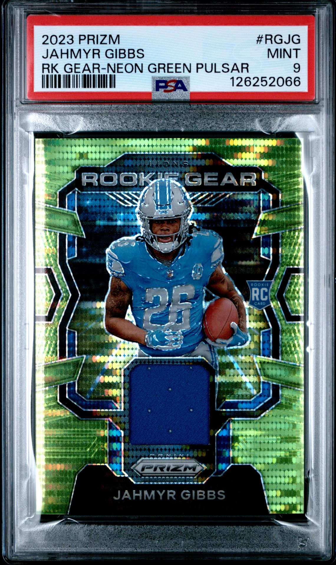 2023 Panini PANINI PRIZM ROOKIE GEAR RK GEAR-NEON GREEN PULSAR #RGJG Jahmyr Gibbs front