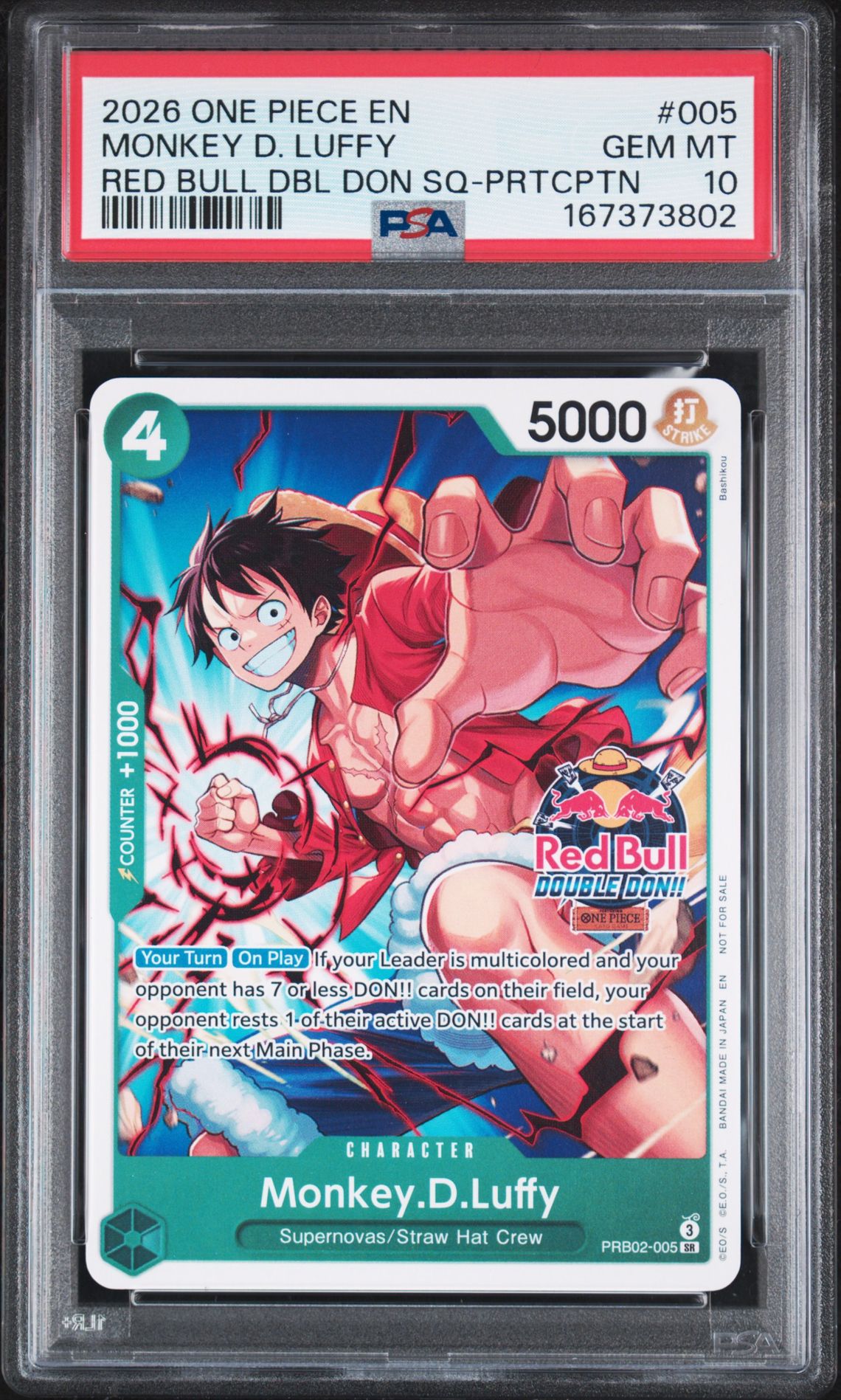 2026 One Piece Promos Monkey D. Luffy #005 (Red Bull Dbl Don Sq-Prtcptn) Gem Mt 10 front view - PSA graded GEM MT 10