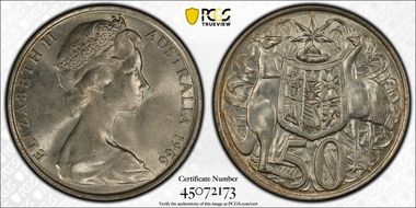 1966 50C KM-67  Ag AU58